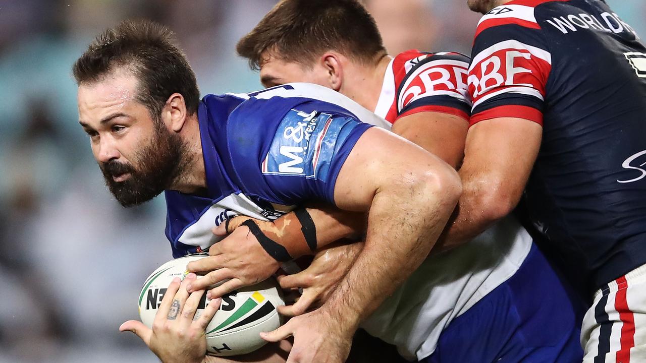 Aaron Woods in action against the Roosters.