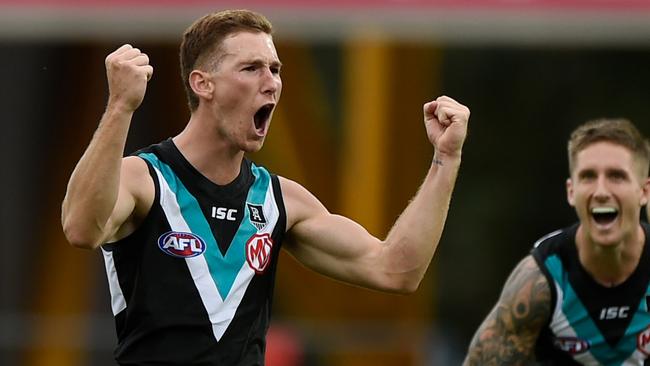 Kane Farrell celebrates celebrates his long-range goal against the Giants. Picture: Matt Roberts/AFL Photos