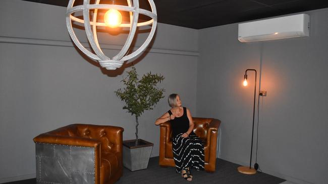 Escape Grid owner Beth Scott sits in one of the waiting rooms of the Bundaberg East business. Picture: Rhylea Millar