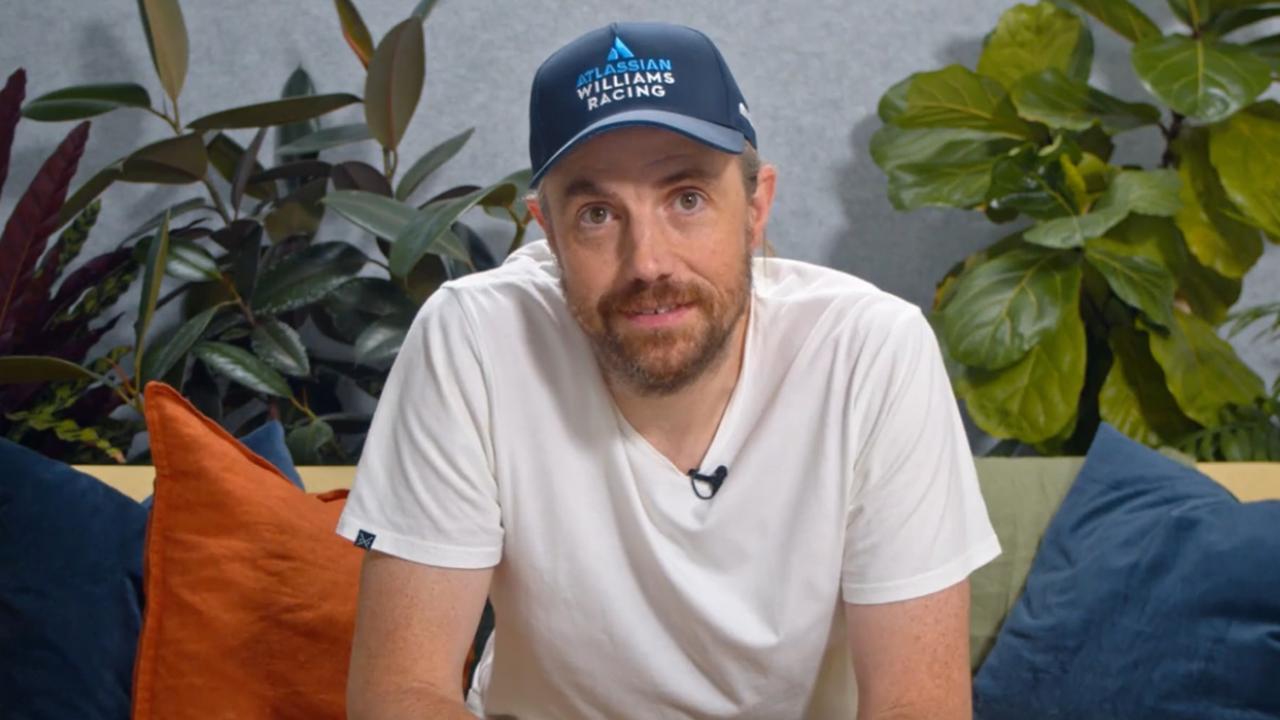 Atlassian co-founder and CEO Mike Cannon-Brookes dons an Atlassian Williams Racing cap as he announces the new partnership.