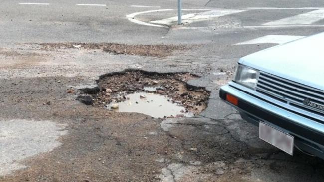 Hate getting a flat tyre after driving through potholes like this? The RACQ has named the worst hot spots for flat tires on the Gold Coast.