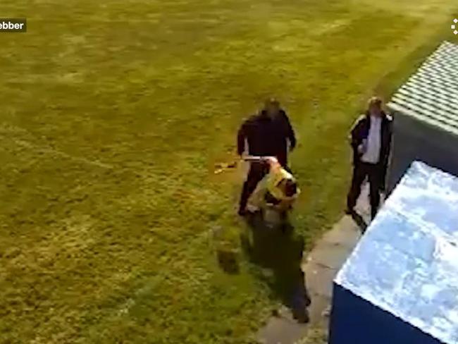 Shocking moment football coach punches teen