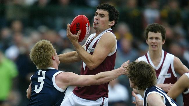 Central Murray FL. Grand Final. Swan Hill v Kerang, at Swan Hill. Xavier Moloney, 2 , Swan Hill, (maroon, white) & Ryan Gillingham, 3 , Kerang, (navy, white)