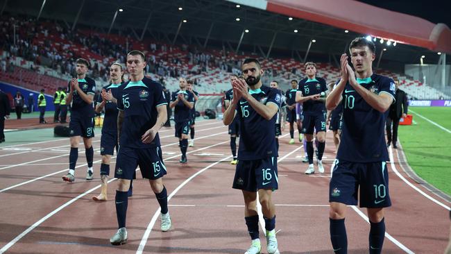 MANAMA, BAHRAIN - NOVEMBER 19: The players of Australia applaud the fans at full-time following the team's draw in the FIFA World Cup Asian 3rd Qualifier Group C match between Bahrain and Australia on November 19, 2024 in Manama, Bahrain. (Photo by Christopher Pike/Getty Images)