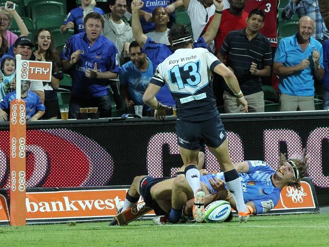 Nick Cummins scores the third try in his hat-trick for the Force against the Waratahs.