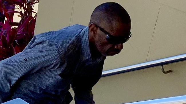 Desmond Ray Burns runs into the Mackay courthouse on September 30 for his sentence. Picture: Duncan Evans