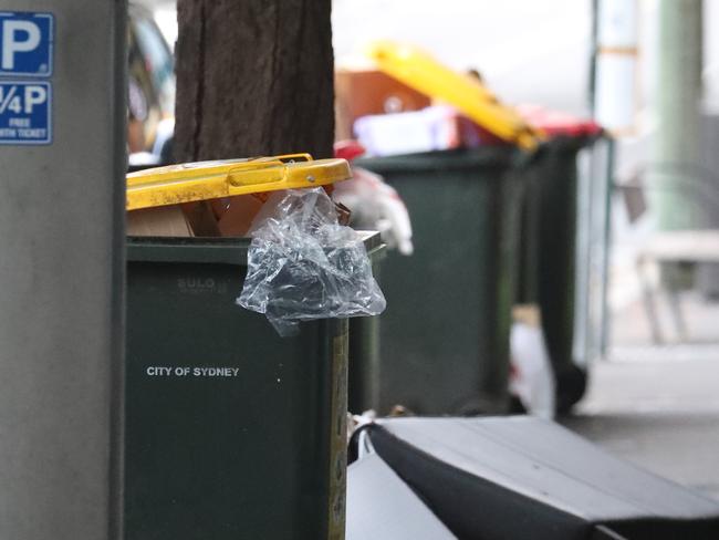 Daily Telegraph January 25/1/23.  Crown Street Surry Hills. Bins on Sydney streets some overflowing and attacked by birds or rats.picture John Grainger