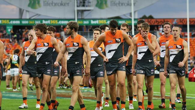 Dejected GWS Giants leave the field after their huge loss to Richmond Tigers at Spotless Stadium. pic. Phil Hillyard