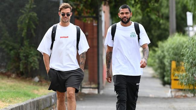 Jy Simpkin and Tarryn Thomas arrive at Arden St on Monday. Picture: Getty Images