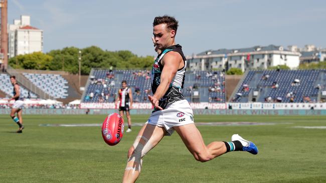 Karl Amon in action during last year’s China game against the Saints. Picture: Michael Willson/AFL Photos