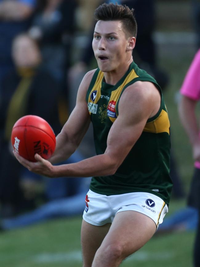 Anthony Scott in action for Old Trinity. Picture: Stuart Milligan