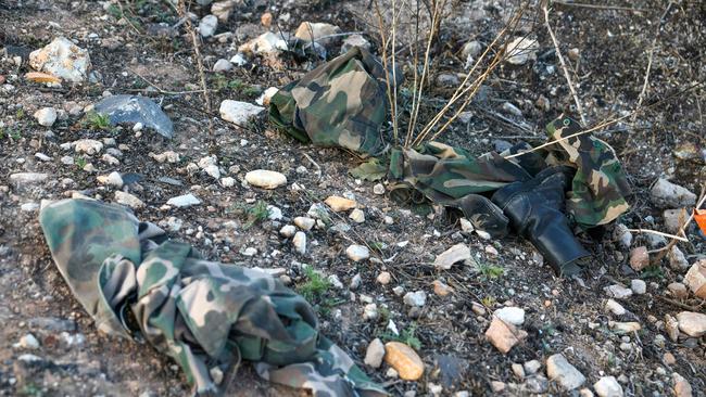 Fatigues discarded by disillusioned Syrian army soldiers outside Homs. Picture: Omar Haj Jadour/AFP