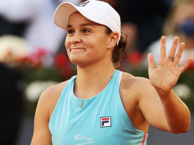 MADRID, SPAIN - MAY 03:  Ashleigh Barty of Australia celebrates winning match point during her match against Iga Swiatek of Poland at La Caja Magica on May 03, 2021 in Madrid, Spain. (Photo by Clive Brunskill/Getty Images)