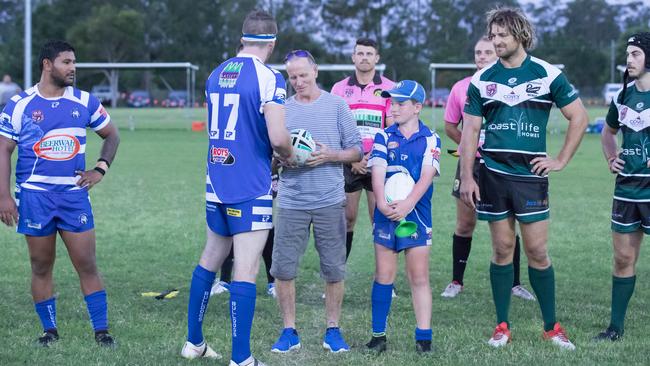 As a mark of respect, and support, Mr Brandon was pulled out onto the field and presented with a signed football during the clash between his former clubs Beerwah and Maroochydore in 2018.