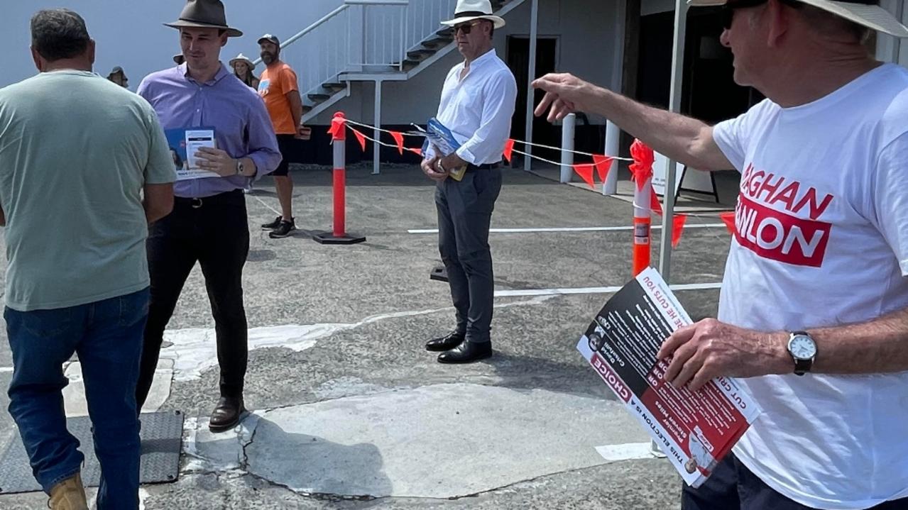 Bonney LNP MP Sam O'Connor talks to voters the pre-polling booth at Nerang in the Gaven electorate. Surfers Paradise MP John-Paul Langbroek is to his right.