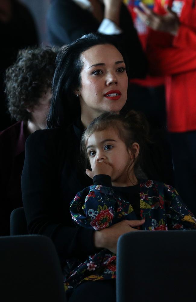 Hunt’s wife, Emma, and daughter Halo sit in the crowd of his farewell press conference. Picture: Adam Head