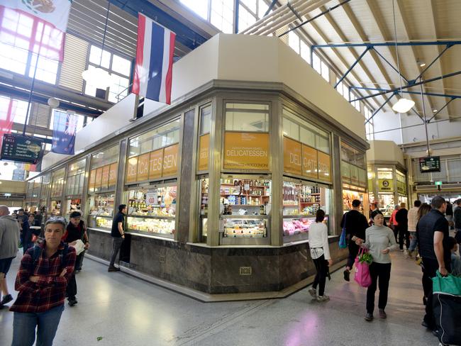 The normally bustling Queen Victoria Market is significantly quieter with many people staying home or avoiding large crowds. Picture: Andrew Henshaw