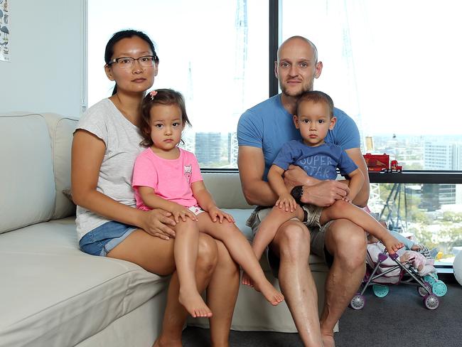 Ilya Levchenko, his wife Anastasia Chen and their two-year-old twins Alina and Ivan returned to their unit in the Opal Tower. Picture: Tim Hunter