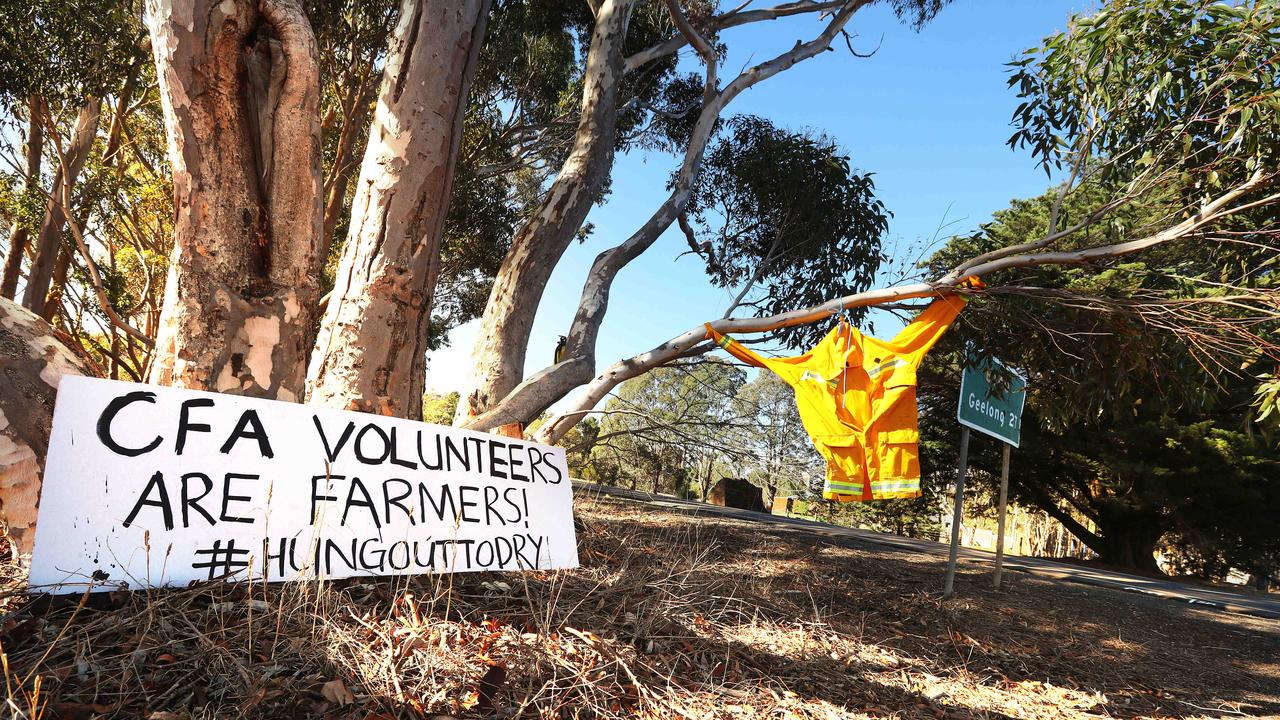 CFA volunteers have put signs and their uniforms in the main street of Inverleigh in protest of the fire services levy. Picture: Alison Wynd