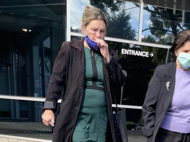 Registered nurse Lisa Robson, 60, of Umina Beach, (green dress) leaving Gosford Local Court where she was convicted of assaulting a patient. Picture: NewsLocal