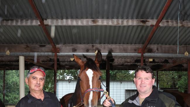 Trainers Troy Kilgawer and Rob Gillahan before the first race. Picture: Brendan Beckett