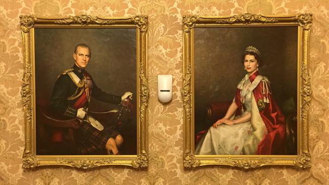 The Queen and Prince Philip in less than pride of place up a stairway at Burnside Civic Centre.