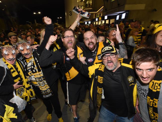 Richmond fans celebrating after winning the semi-final. Picture: Tony Gough