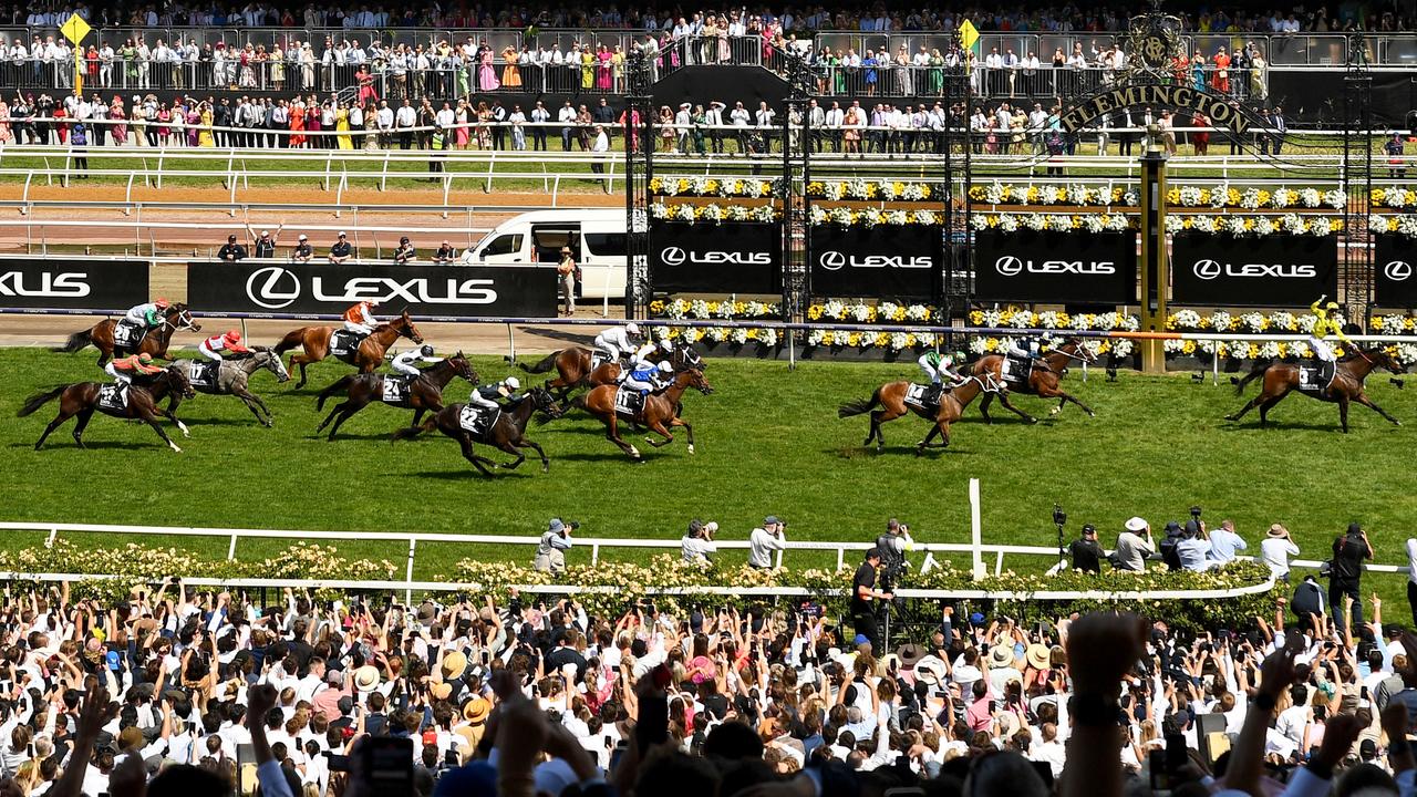 MELBOURNE, AUSTRALIA - NOVEMBER 07: Mark Zahra riding Without a Fight wins the Lexus Melbourne Cup during Melbourne Cup Day at Flemington Racecourse on November 07, 2023 in Melbourne, Australia. (Photo by Josh Chadwick/Getty Images)