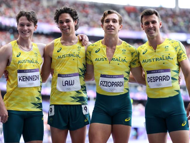 Lachland Kennedy, Calab Law, Joshua Azzopardi and Jacob Despard pose before the 100m relay at the Paris Olympics. (Photo by Hannah Peters/Getty Images)