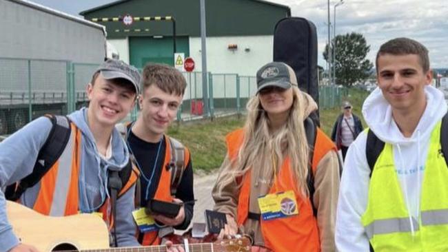 Alex Yurkiv: “When we think of him we will always remember him laughing with a guitar in his hands.” He is pictured at the border of Ukraine and Poland sharing his faith with Ukrainian refugees.