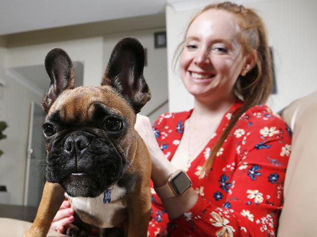 Kimberley Swaysland and Melvin the French Bulldog pictured at her home in Calamvale, Brisbane 25th of November 2020.  Kimberley is looking to use the Federal Government's tax cuts that will see an extra $20 a week in her to put in her savings.  (Image/Josh Woning)