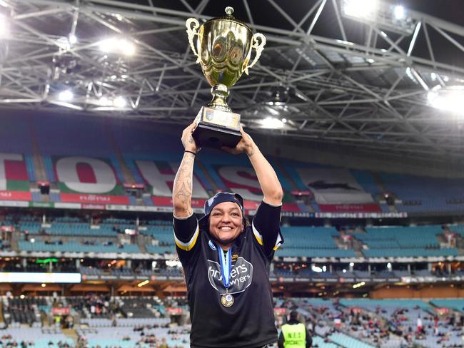 Mounties’ Sharnita Woodman lifts the trophy. Picture: NRL Photos