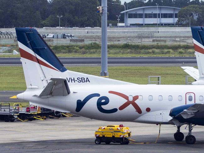 SYDNEY, AUSTRALIA - NewsWire Photos FEBRUARY 06, 2021: Rex planes are seen parked on the tarmac at Sydney Domestic Airport.  Picture: NCA NewsWire / Jenny Evans