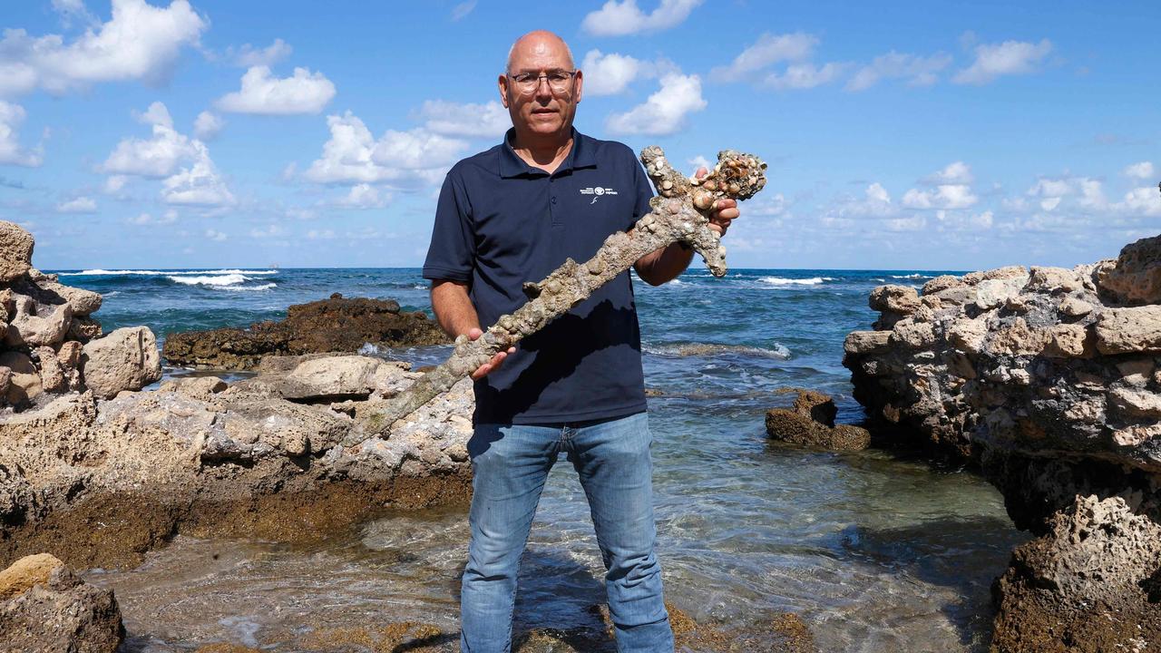 The diver was given a certificate of appreciation for his find. Picture: Jack Guez/AFP