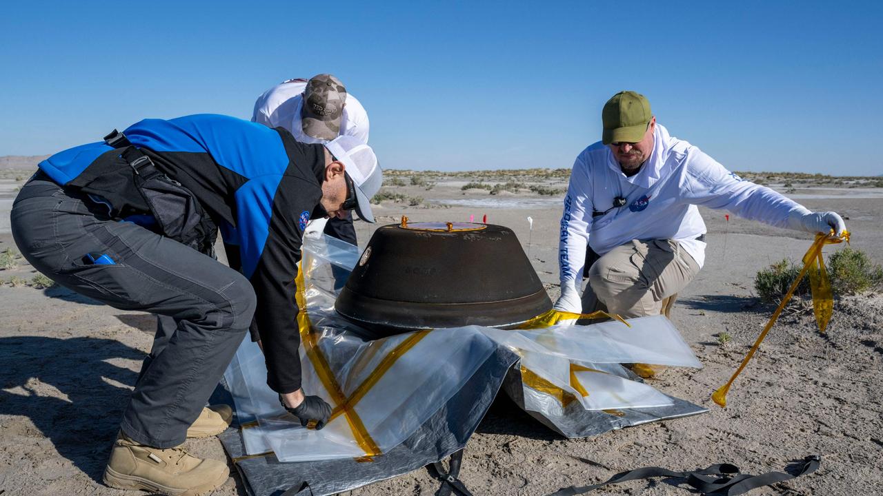 The asteroid sample is collected from the Utah desert. Picture: AFP Photo/NASA/Keegan Barber