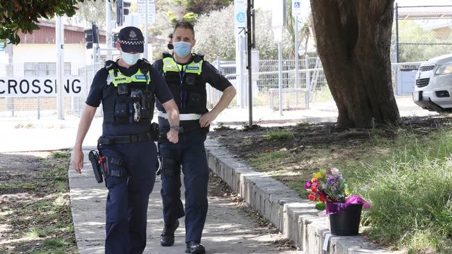 Police walk past the scene of a fatal stabbing in Seaford in November 2020. Picture: David Crosling