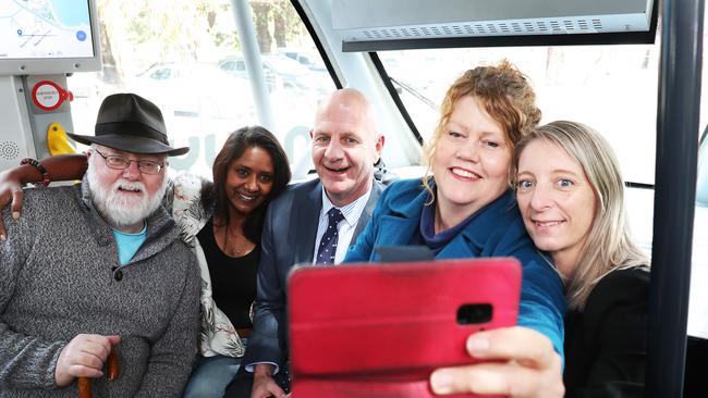 Bill Harvey Deputy Lord Mayor of Hobart, councillor Zelinda Sherlock, Minister Peter Gutwein, Hobart Lord Mayor Anna Reynolds and Stacey Pennicott of the RACT take a selfie in the driverless bus. Picture: NIKKI DAVIS-JONES