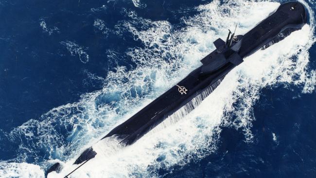 Royal Australian navy submarines. The first Collins-class submarine HMAS Collins ploughs through rough seas, 20km offshore of SA during first trials 31 Oct 1994. (Pic by staff photographer Leon Mead)