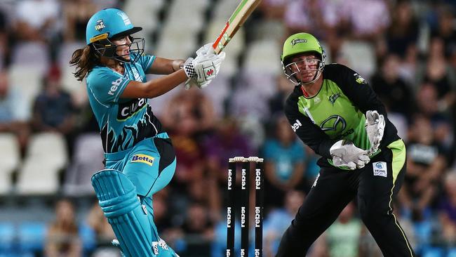 Action from the Women's Big Bash League Twenty20 cricket match between the Brisbane Heat and the Sydney Thunder at Cazalys Stadium, Cairns. Heat's Josie Dooley finds the boundary. PICTURE: BRENDAN RADKE