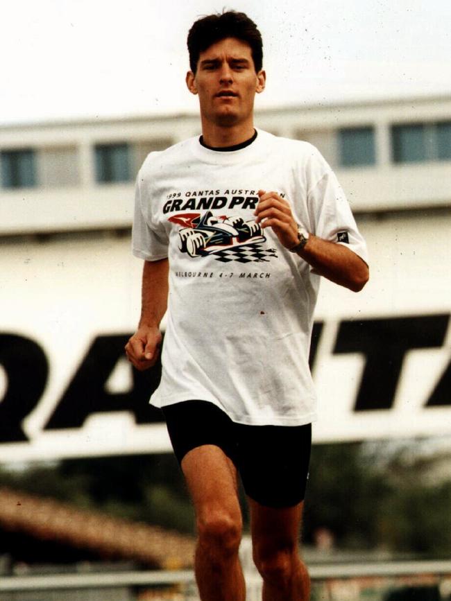 A younger Mark Webber working out before a race.