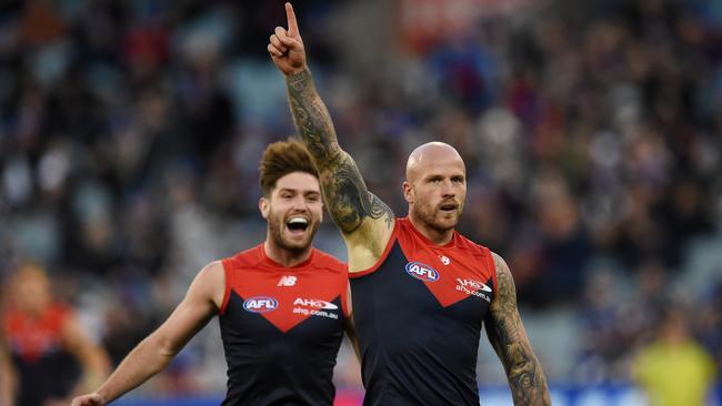 Nathan Jones celebrates a goal against Collingwood. Picture: AAP