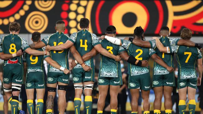 Wallabies players stand for the national anthem during the 2020 Tri-Nations match against the Argentina Pumas at Bankwest Stadium on Saturday. Picture: Getty Images