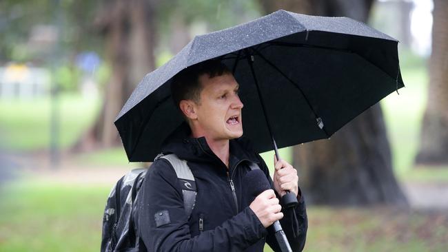 Paddy Gibson speaking at the Black Lives Matter protest held at Djabarrgalli (Sydney Domain). His house was attacked by three men. Picture: Jonathan Ng