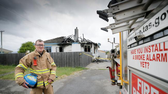 Launceston station officer Ben Wilson at a home destroyed by fire at Mayfield, Launceston. Picture: PATRICK GEE