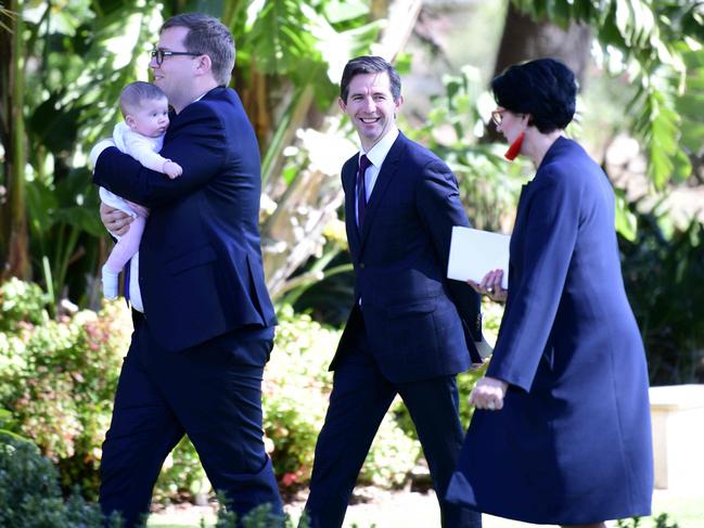 Minister of Education John Gardener, Senator Simon Birmingham, Deputy Premier Vicki Chapman arrive at Rostrevor College for the wedding. AAP Image / Bianca De Marchi