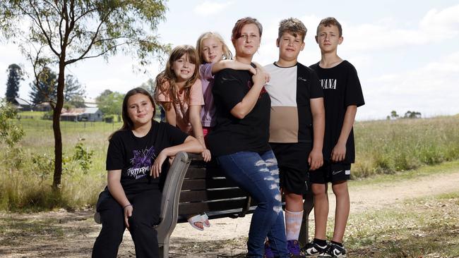 DAILY TELEGRAPH 11TH OCTOBER 2024Pictured at Rouse Hill Regional Park in Sydney is single mum Jayla England with her kids Georgina (11) Taylor (8) Lily (6) Bobby (10) and Jayce (13).Jayla is having to find ways to save money but is struggling to get by in the cost of living crisis.Picture: Richard Dobson