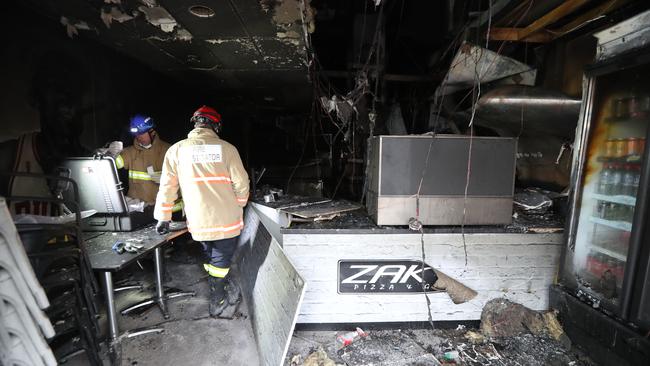 Zak's Pizza and Grill at the Happy Valley Shopping Centre was destroyed in an arson attack on Tuesday. Picture: Tait Schmaal