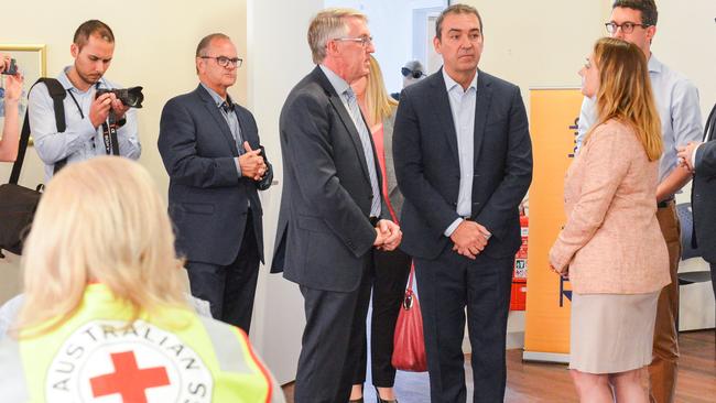 Premier Steven Marshall and Human Services Minister Michelle Lensink talk with Paul Reardon, state manager emergency relief, at the Bushfire Recovery Centre at Lobethal. Picture: Brenton Edwards