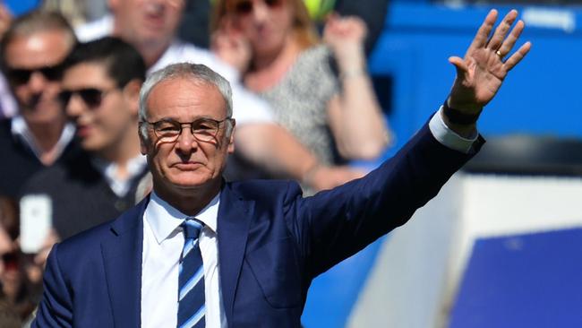 (FILES) This file photo taken on May 15, 2016 shows Leicester City's Italian manager Claudio Ranieri waving to fans before the English Premier League football match between Chelsea and Leicester City at Stamford Bridge in London on May 15, 2016. Claudio Ranieri has been sacked as manager of Leicester City just months after leading the club to a remarkable Premier League title triumph, the Midlands side announced on February 23, 2017. / AFP PHOTO / GLYN KIRK / RESTRICTED TO EDITORIAL USE. No use with unauthorized audio, video, data, fixture lists, club/league logos or 'live' services. Online in-match use limited to 75 images, no video emulation. No use in betting, games or single club/league/player publications. /