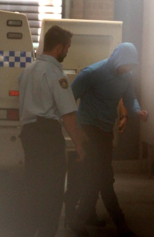 Salim Mehajer is taken from a police van to face Burwood court. Picture: John Grainger